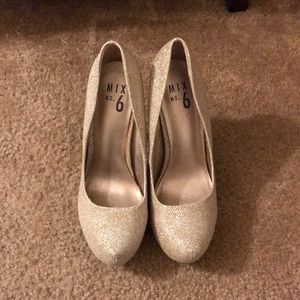 Gold high heels